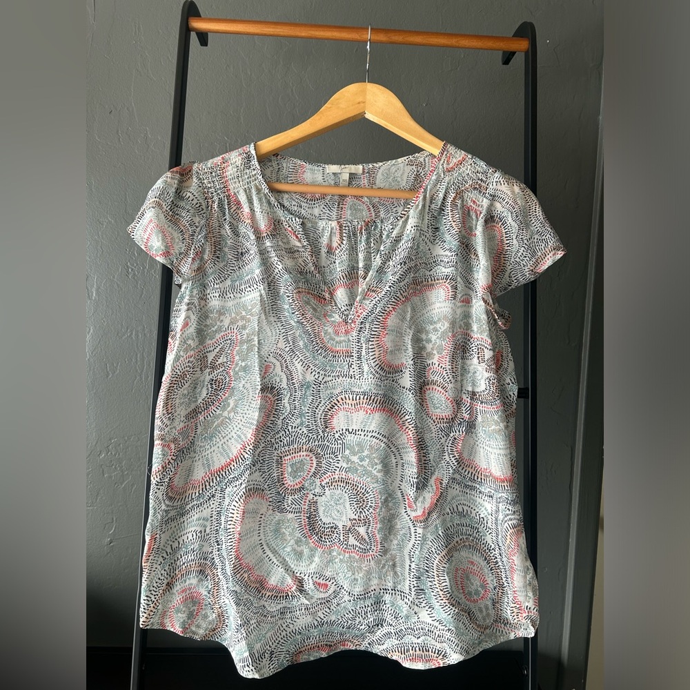 Joie 100% silk short sleeved white blouse with orange pattern
